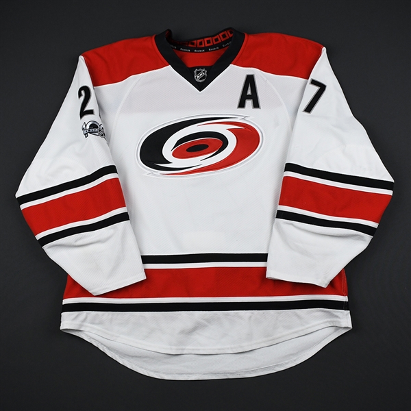 Faulk, Justin *<br>White Set 2 - w/A and NHL Centennial patch - Photo-Matched - Autographed<br>Carolina Hurricanes 2016-17<br>#27 Size: 56