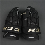 Ferraro, Landon<br>CCM HG12 Gloves, worn in Winter Classic Practice on December 31, 2015<br>Boston Bruins 2015-16<br>#29 Size: 14