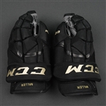 Miller, Colin<br>CCM HG12 Gloves, worn in Winter Classic Practice on December 31, 2015<br>Boston Bruins 2015-16<br>#48 Size: 15