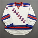 Del Zotto, Michael *<br>White Set 1 - NHL Debut - First NHL Assist<br>New York Rangers 2009-10<br>#4 Size: 56