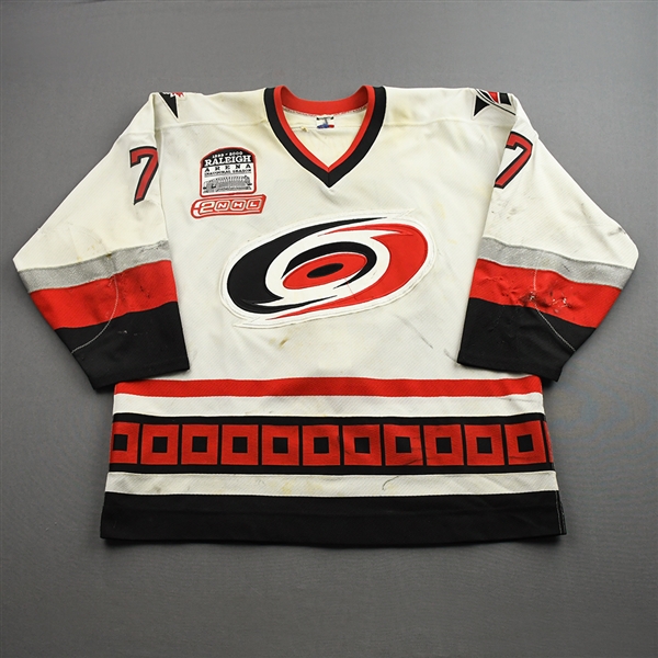 Leschyshyn, Curtis *<br>White, Airknit with inagural patch, Millenium patch, and Steve Chiasson memorial patch<br>Carolina Hurricanes 1999-00<br>#7 Size: 56