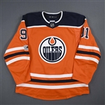 Caggiula, Drake *<br>Orange Set 1 w/ NHL Centennial Patch <br>Edmonton Oilers 2017-18<br>#91 Size: 56