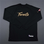 Champagnie, Justin<br>City Edition Long Sleeved Shooting Shirt - Game-Issued (GI)<br>Toronto Raptors 2021-22<br>#11 Size: L Tall